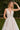 Model is posing in the Cinderella Divine CDS436W wedding dress